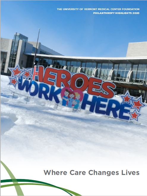 Newsletter cover image of the front of UVM MC Medical Center with a sign that says "Heroes work here".