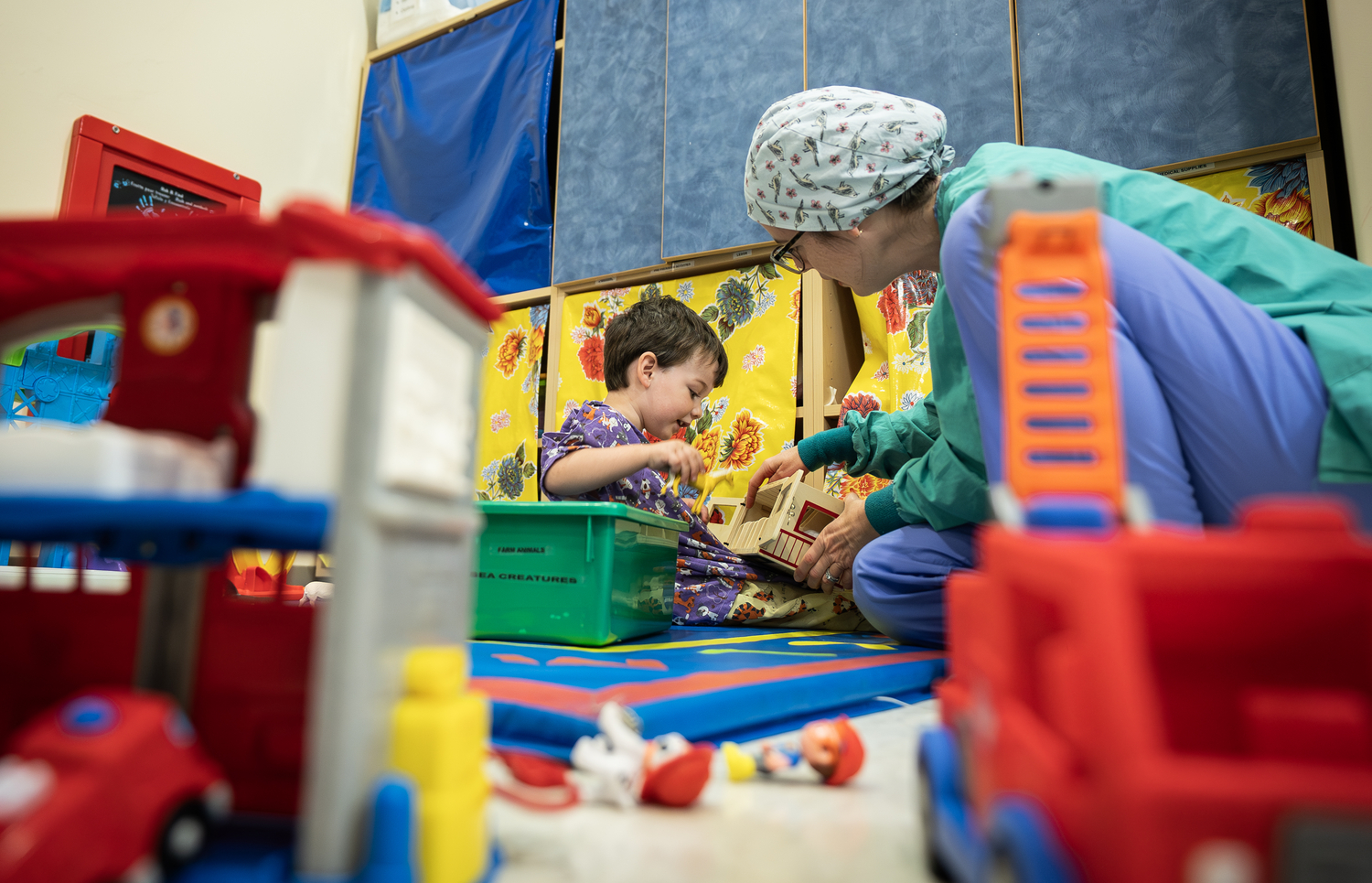 Nurse plays with peds patient