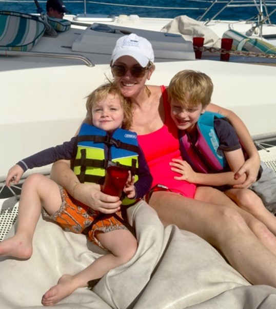 Amanda Kallen, MD on sailboat with two children