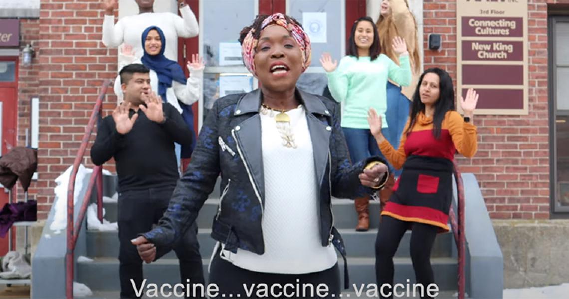 Screenshot of a music video related to the COVID-19 vaccine.