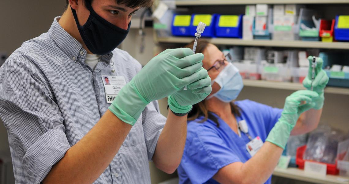 CVMC Pharmacy Staff working with COVID Vaccine