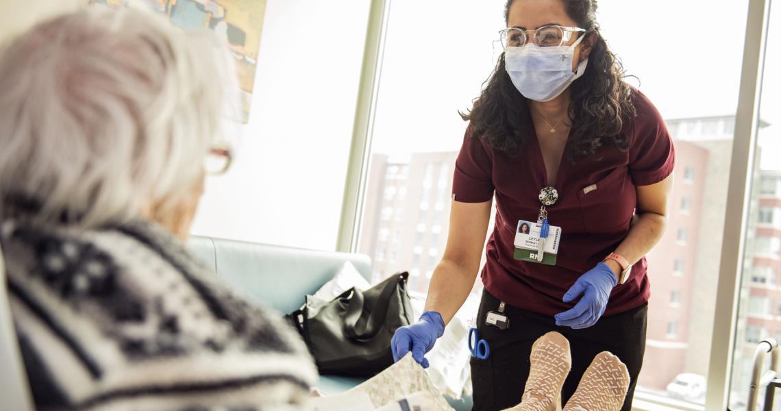 Leyla Serway, RN with patient
