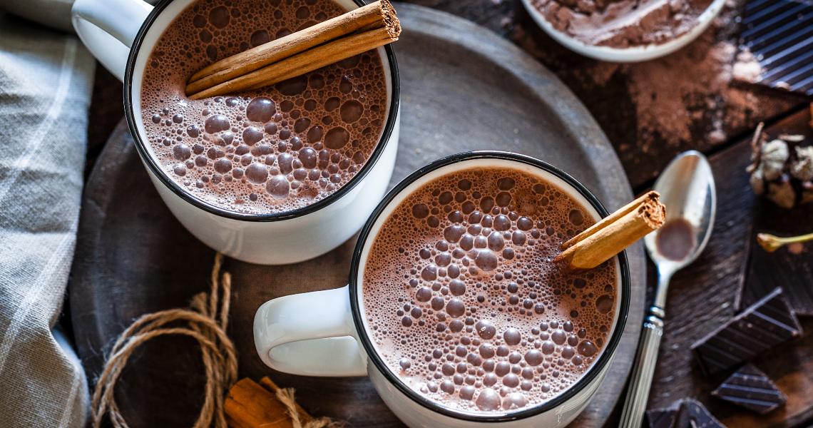 Mug of chocolate hot cocoa with cinnamon stick