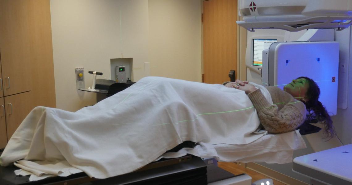 Patient lying down in a radiation oncology machine