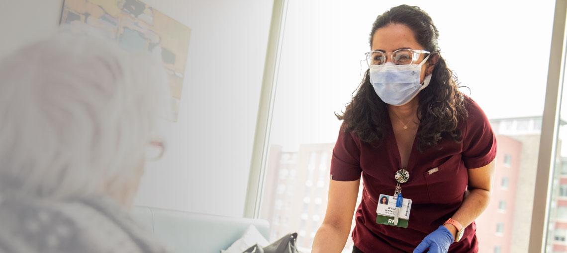 Leyla Serway, RN with patient.