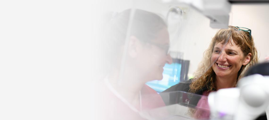 UVM Health Network provider performs mammogram on patient.