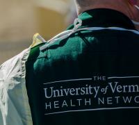 Provider with UVM Health Network logo on back