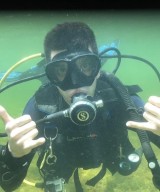 Kyle Kellett, MD scuba diving. 