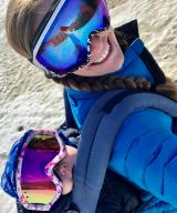 Photo Meagan Oakes with her baby on her back