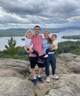 Zach with family mountain top