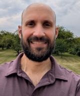 Headshot of Justin DeAngelis, MD, FACOG