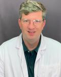 Headshot of John M. Saunders, MD.