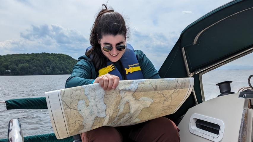 Palliative Care Fellow reads a map while on an Academic Half Day event